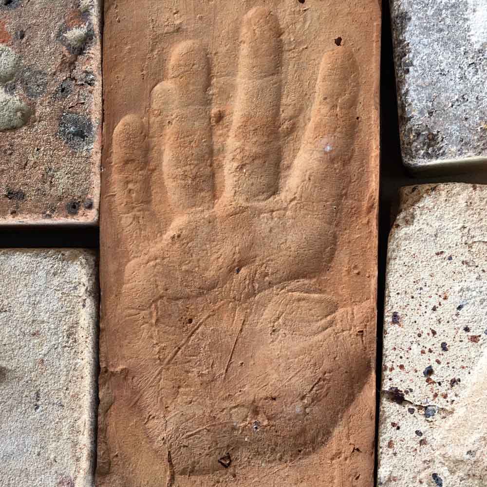 A ghostly hand from a bygone era sending a message into the future. Who was this person? 